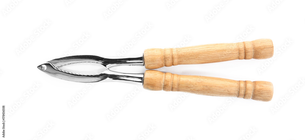 Nutcracker with wooden handle on white background