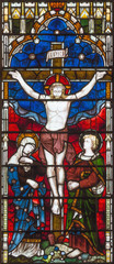 Wall Mural - LONDON, GREAT BRITAIN - SEPTEMBER 19, 2017: The Crucifixion on the Stained glass in St Mary Abbot's church on Kensington High Street.