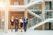 © alfa27 - Business people walking in the office corridor