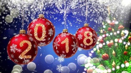 Wall Mural - red balls with numbers 2018 hanging on the background of a blue bokeh and a rotating christmas tree 