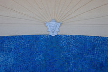 Closeup Of Fountainhead With Blue Mosaic Tiles