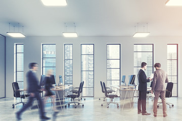 Narrow windows, open space office side people