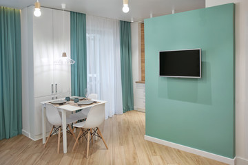 Wall Mural - Interior of modern apartment with table served for dinner