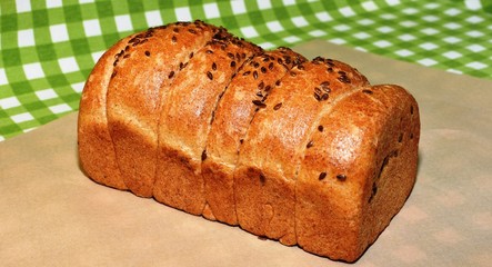 Freshly baked bread of lump dough and sesame