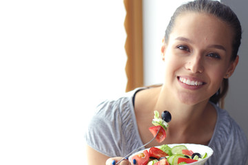 A beautiful girl eating healthy food. Beautiful girl