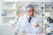 © Elnur - Young researcher scientist doing a water test contamination expe