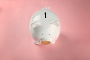 Poster - Cute piggy bank on color background