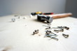 © MultifacetedGirl - Nails, screws, and a hammer on home improvement construction site