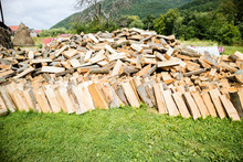 Stacked Firewood Heap. Dry Chopped Firewood Logs