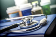 © digicomphoto - Stethoscope On A Medicine Book, Conceptual Image