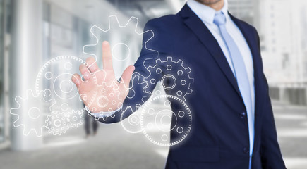 Poster - Businessman touching technology interface with gear wheel setting
