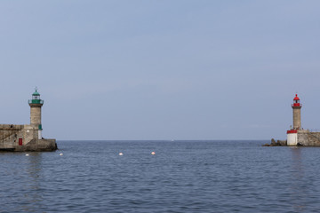 entrance to the port between two lighthouses