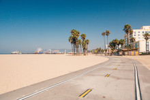Beautiful Morning Sunrise Lights At The Venice Beach In Los Angeles. Bicycle Lane By The Beach.