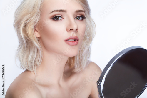 Pretty Girl With White Hair Fixed Behind Big Eyes Thick Eyebrows