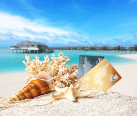 Wall Mural - Composition with credit cards on tropical beach