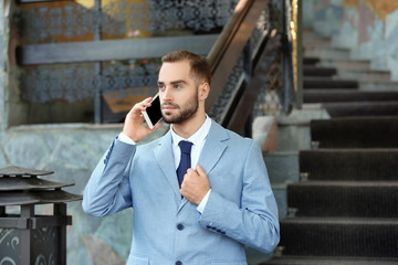 Poster - Handsome man in elegant suit, outdoors