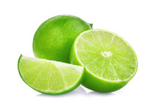 Whole And Half With Slice Of Fresh Green Lime Isolated On White Background