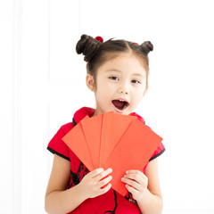 happy chinese new year. little girls holding red envelope.