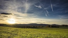Sunny Landscape With Cloudy Heaven Before Sunset. 4K Timelapse.