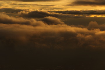 Wall Mural - Sunset White Cloud sky at high level attitude, view from window airplane