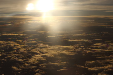 Wall Mural - Sunset White Cloud sky at high level attitude, view from window airplane