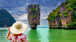 © JRP Studio - Woman tourist looking at James Bond island in Thailand