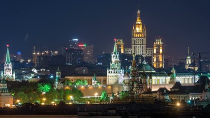 Wall Mural - Panoramic view of Moscow timelapse - Kremlin towers, State general store, Stalin skyscraper, residential building at night