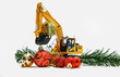 © chaphot - Christmas ornament and Excavator model ,  Holiday celebration concept new year on white background