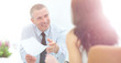 © ASDF - boss discusses with the assistant business documents in the offi