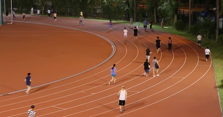 Wall Mural - Tin Tsui Wai, Hong Kong 26 October 2017:- People jogging in Sport complex