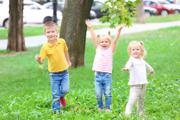 Wall Mural - Adorable little children playing outdoors