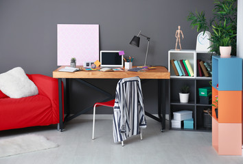 Sticker - Modern room interior with laptop on wooden table