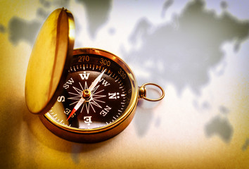 Wall Mural - Compass on map background