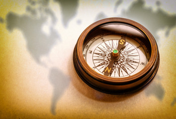 Wall Mural - Compass on map background