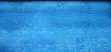 The Texture Of The Brick Wall Of Many Rows Of Bricks Painted In Blue Color