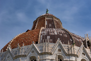 Wall Mural - Details of the exterior of the Pisa Baptistery of St. John, the largest baptistery in Italy, in the Square of Miracles (Piazza dei Miracoli), Pisa, Italy.