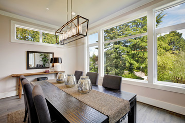 Wall Mural - Luxurious modern dining room boasts a black dining table