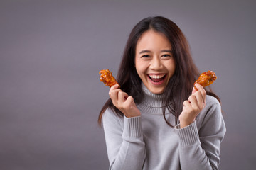 happy woman with fried chicken