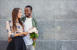 © Prostock-studio - Man giving flowers for his beautiful girlfriend