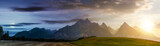 Fototapeta Góry - day and night time change concept over rural area in Tatra Mountains. beautiful panorama of agricultural area. gorgeous mountain ridge with high rocky peaks with sun and moon