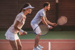 © georgerudy - Couple playing tennis