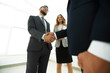 © ASDF - Close up business man handshake together on meeting room