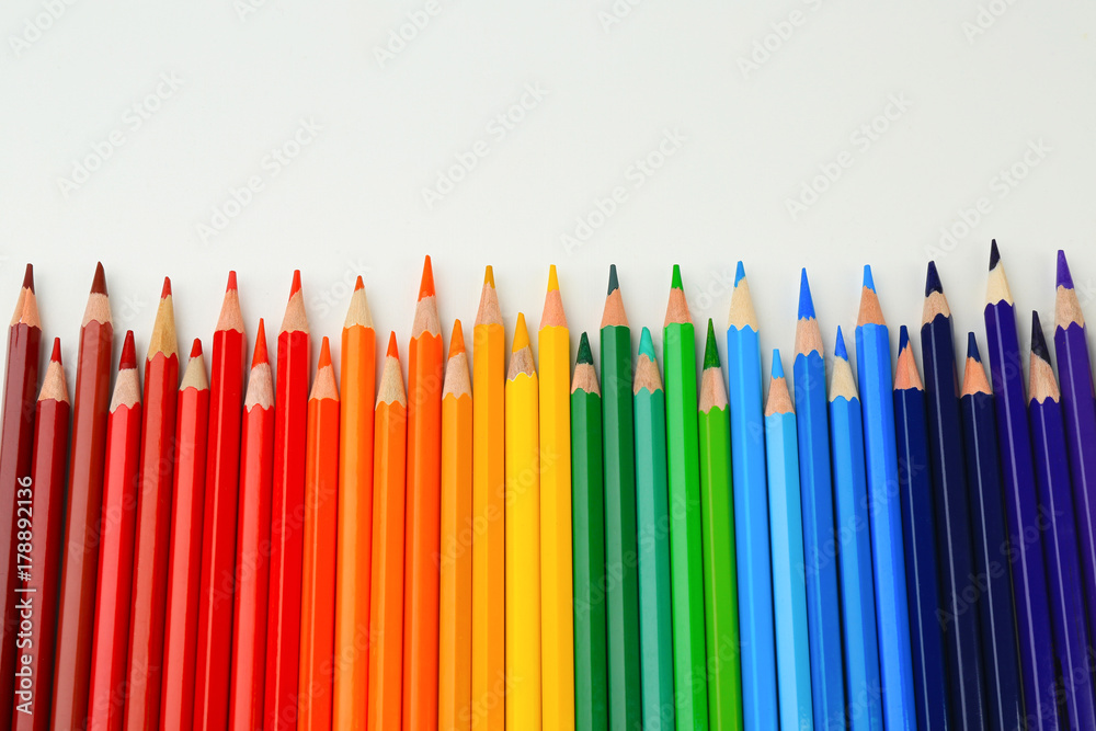Colorful pencils on white background