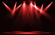 Stage lights. Red spotlight strike through the darkness.