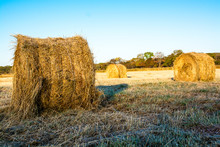 Farmland With Haystacks In Autumn.