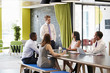 © Monkey Business - Young male manager addressing colleagues at informal meeting