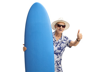 Sticker - Elderly tourist with a surfboard making a thumb up sign