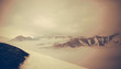 Panorama photo. Sepia mountains landscape. Mountains in the mist