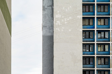 Facade of an old high-rise building. Urbanization concept