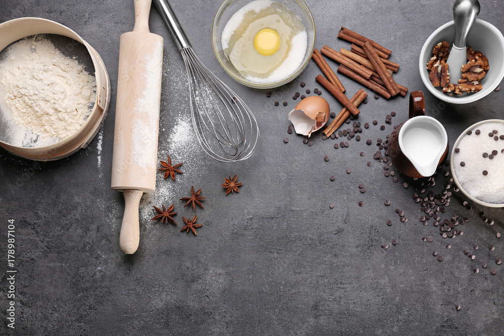 Composition with flour on gray table